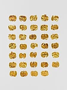 Thirty-four gold dress ornaments by Unknown Artist
