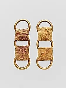 Two gold belt attachments by Unknown Artist