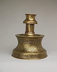 Candlestick with Repeating Seated Figure, Inscription, and Flowers by Unknown Artist