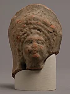 Head of a Woman by Unknown Artist