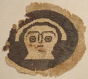 Roundel with Human Face by Unknown Artist