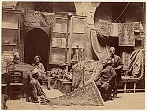 [Bazaar, Rug Merchants] by Unknown