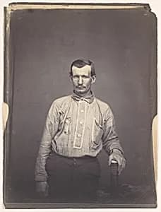 [Man Holding Patent Office Book] by Oliver H. Willard