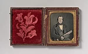 [Mason Holding a Trowel] by Unknown