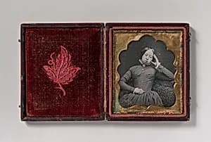 [Seated Woman Wearing Glasses] by Unknown