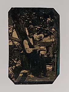 [Tinsmith Working Under a Tree] by Unknown
