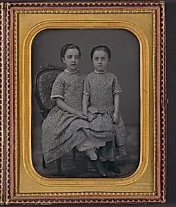 [Two Girls in Identical Dresses] by Jeremiah Gurney