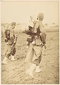 [Two Soldiers Packing Gear] by Unknown