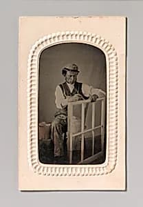 [Young Man Painting Window Frame] by Unknown