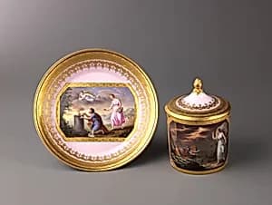 Covered cup and saucer by Anton Kothgasser