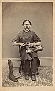 Portrait of a Bootmaker by American 19th Century