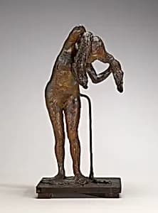 Woman Arranging Her Hair by Edgar Degas