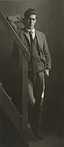 Young Man on Stairs by André Kertész