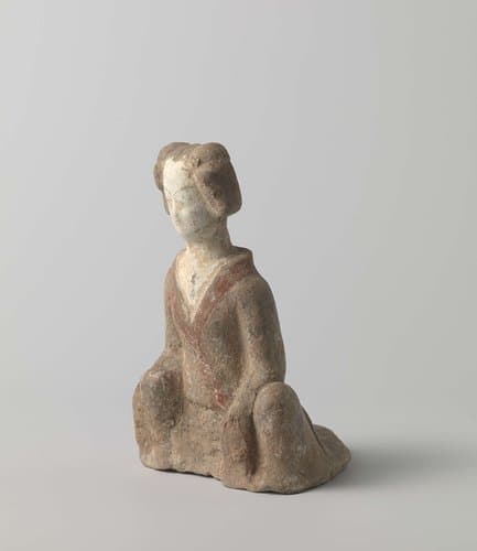Tomb figure of a squatting woman by anonymous
