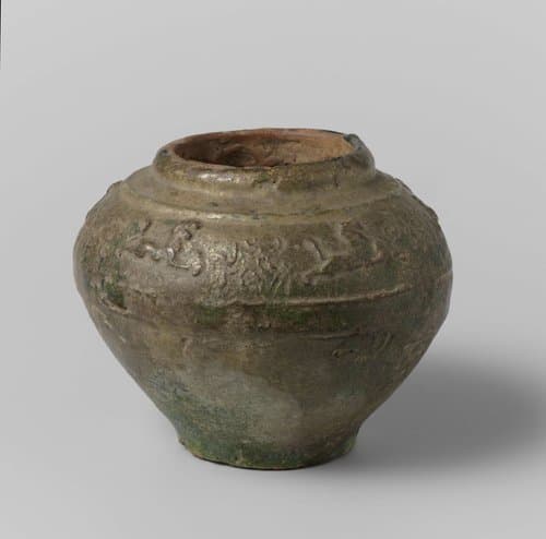 Jar with tigers and floral scrolls in relief by anonymous