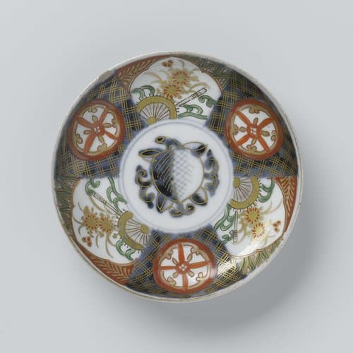 Saucer-dish with auspicious symbols, diaper pattern and scrolls by anonymous