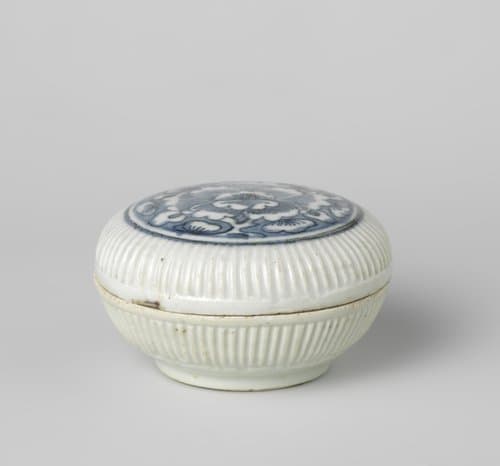 Round box with ribbed sides and a flower in the cover by anonymous