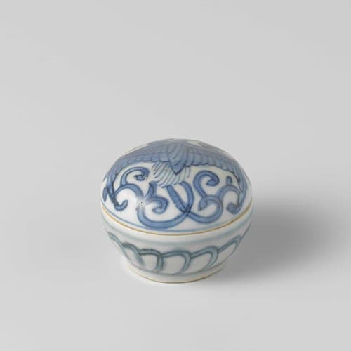 Round box with a feng huang en scrolls by anonymous