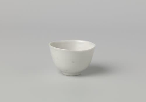 Bowl with a white glaze and irregular rim by anonymous