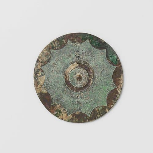 Mirror with scalloped edge and rosettes by anonymous