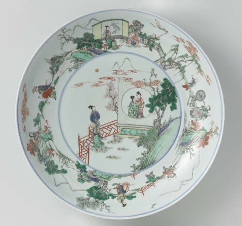 Schotel met vrouwen en jongens in een landschap by anonymous