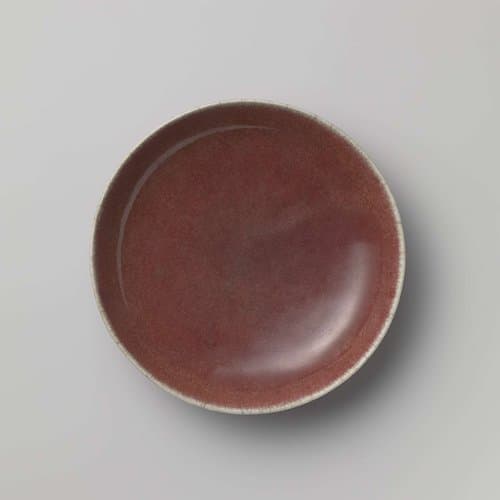 Saucer dish with a crackled red glaze by anonymous
