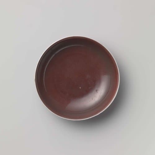 Saucer-dish with a red glaze by anonymous