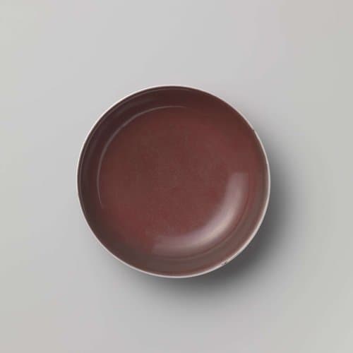 Saucer-dish with a red glaze by anonymous