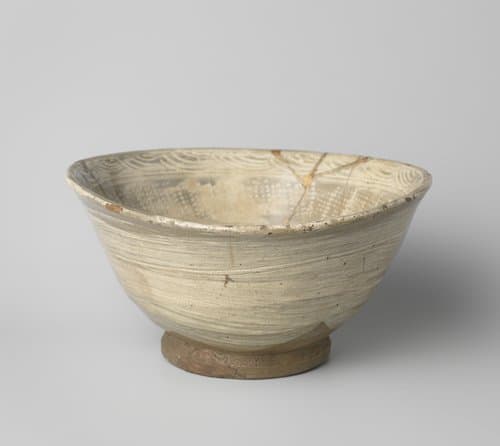 Bowl with incised floral patterns and ornamental borders by anonymous