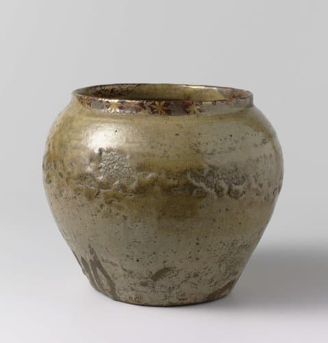 Ovoid jar with a yellow green glaze and laquer by anonymous; anonymous
