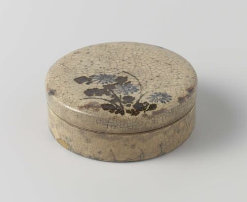 Round box with flowering plants by anonymous; anonymous