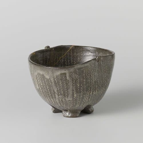Tea bowl with flowers and waving lines by anonymous; anonymous