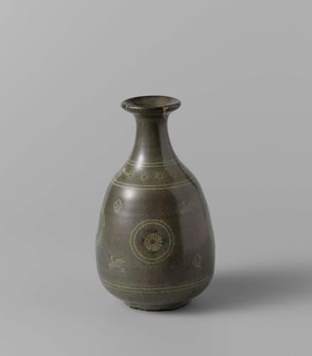 Bottle vase with a stylized flowers in medallions by anonymous; anonymous