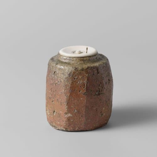 Tea caddy with and orange brown color and green glaze by anonymous; anonymous