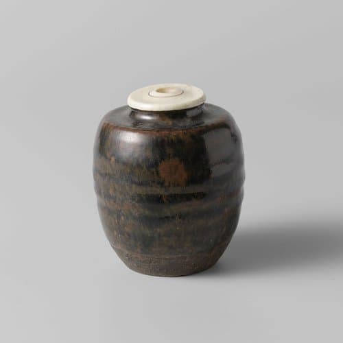 Tea caddy with a brown black glaze by anonymous