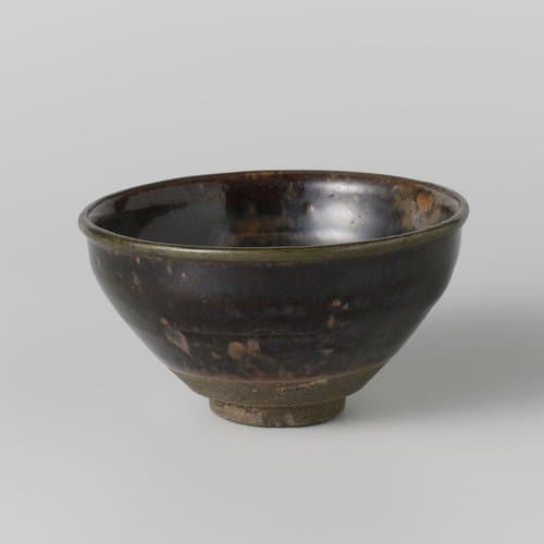 Teabowl with a black brown glaze by anonymous; anonymous