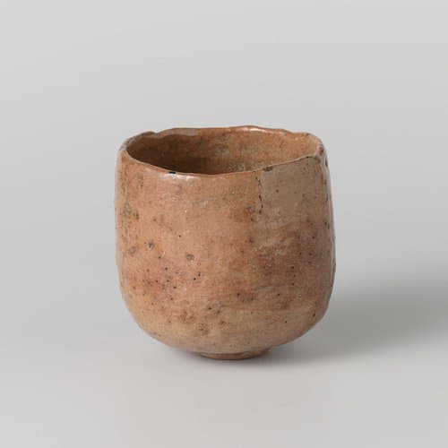 Teabowl with an orange red glaze by anonymous; anonymous
