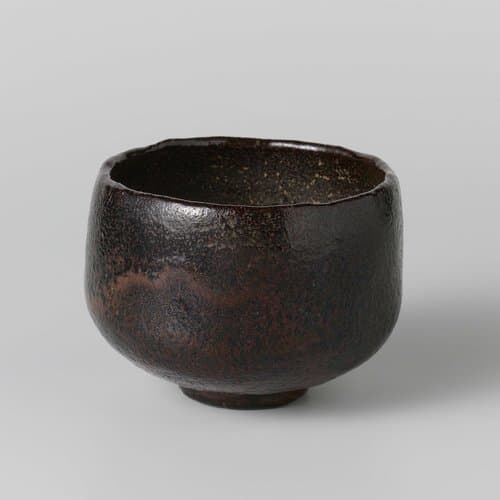 Teabowl with a black brown glaze by anonymous; anonymous