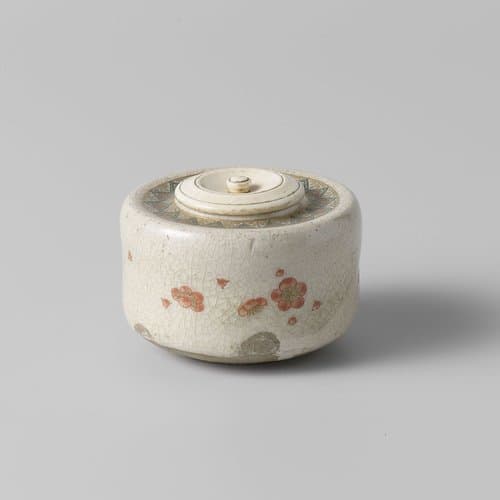 Tea caddy with prunus blossoms and an ornamental border by anonymous