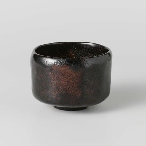 Teabowl with a black brown glaze by anonymous; anonymous