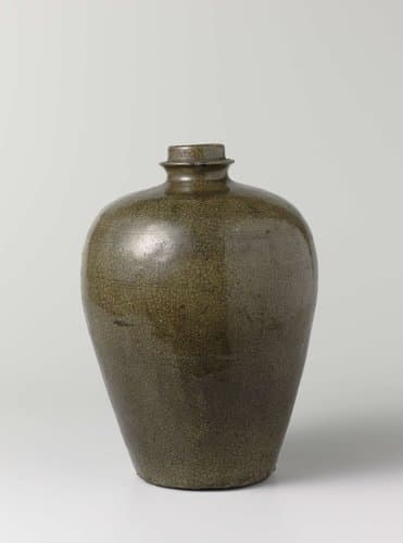 Ovoid bottle vase with a green glaze by anonymous