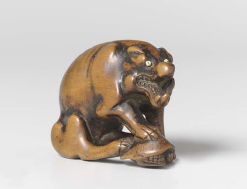 Netsuke in de vorm van een wolf met schildpad by Tomotada