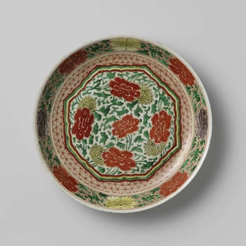 Schotel met bloemranken in een cartouche by anonymous