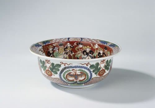 Bowl with ships and Dutch figures by anonymous
