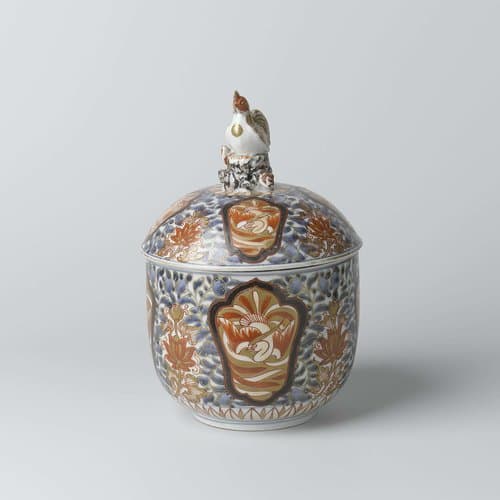 Covered jar with hoo-birds in panels on a ground of lotus and floral scrolls by anonymous