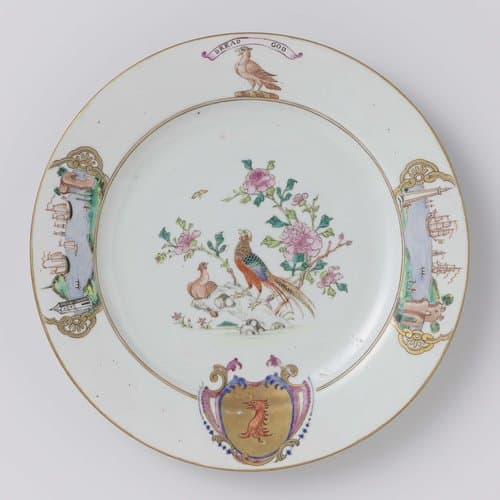 Plate with two pheasants on a rock near flowering plants and the arms of the Munro family by anonymous