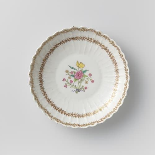 Saucer-dish with fluted sides with a bouquet and foliate scrolls by anonymous