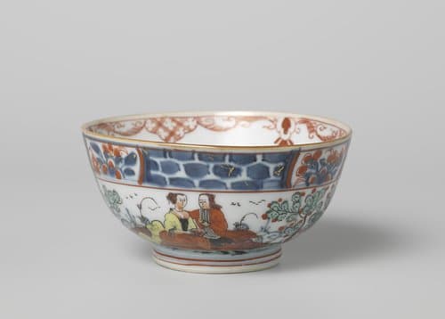 Bowl with a flowerbasket and a courting couple in a landscape by anonymous