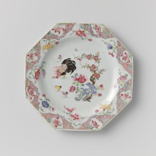 Octagonal plate with a cock and two little chickens near a rock with flowering plants by anonymous