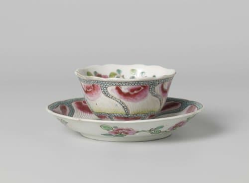 Bell-shaped cup and saucer with undulating flower petals on diaper pattern and flower sprays by anonymous